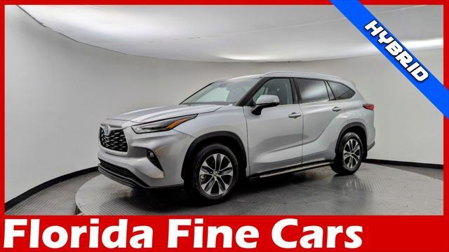 used 2022 Toyota Highlander Hybrid car, priced at $27,299