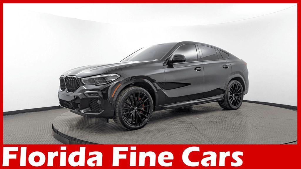 used 2023 BMW X6 car, priced at $57,999