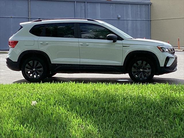 used 2023 Volkswagen Taos car, priced at $18,499