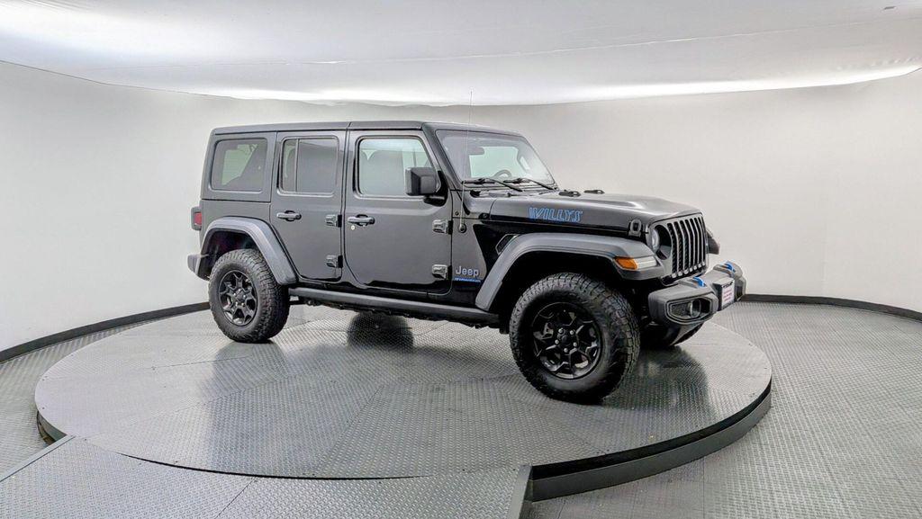 used 2023 Jeep Wrangler 4xe car, priced at $24,699