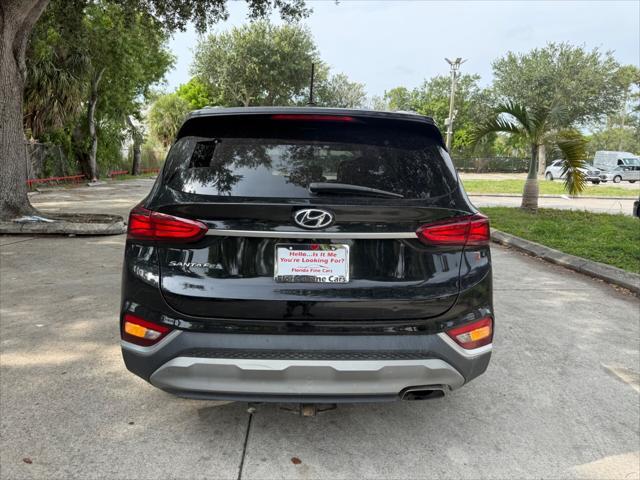 used 2020 Hyundai Santa Fe car, priced at $13,999