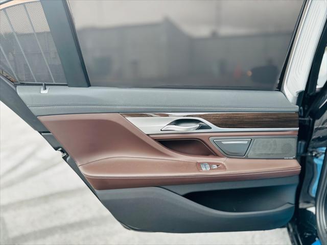 used 2022 BMW 740 car, priced at $34,998
