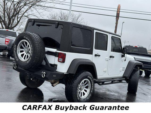 used 2013 Jeep Wrangler Unlimited car, priced at $16,906