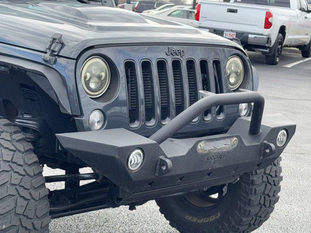 used 2018 Jeep Wrangler JK Unlimited car, priced at $21,609