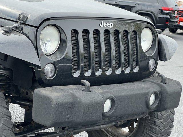 used 2014 Jeep Wrangler car, priced at $18,259