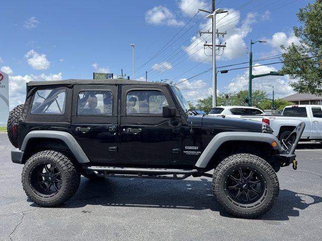 used 2017 Jeep Wrangler Unlimited car, priced at $23,372
