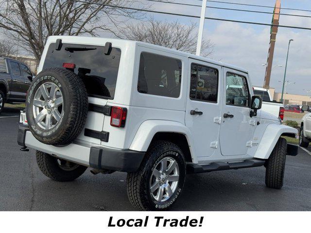 used 2015 Jeep Wrangler Unlimited car, priced at $19,894