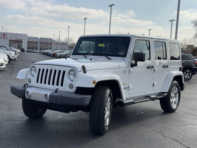 used 2015 Jeep Wrangler Unlimited car, priced at $19,894