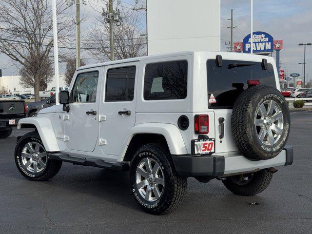 used 2015 Jeep Wrangler Unlimited car, priced at $19,894