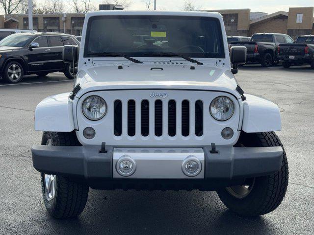 used 2015 Jeep Wrangler Unlimited car, priced at $19,894