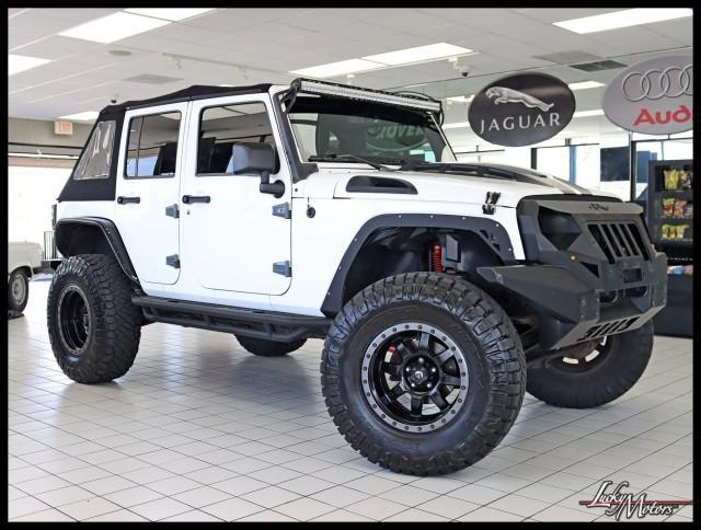 used 2014 Jeep Wrangler Unlimited car, priced at $22,980