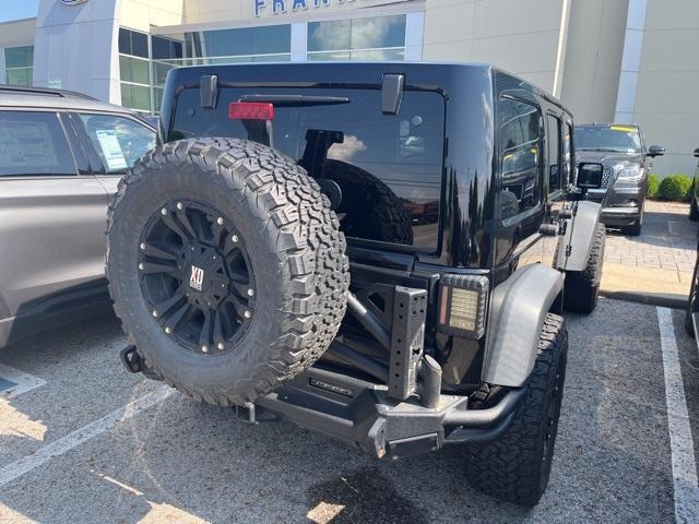 used 2016 Jeep Wrangler Unlimited car, priced at $25,270