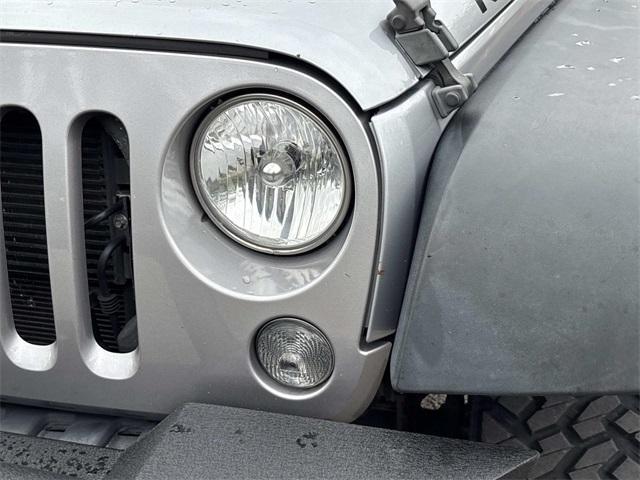 used 2018 Jeep Wrangler JK Unlimited car, priced at $23,980