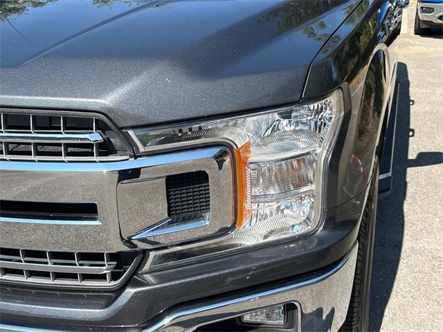 used 2019 Ford F-150 car, priced at $23,193
