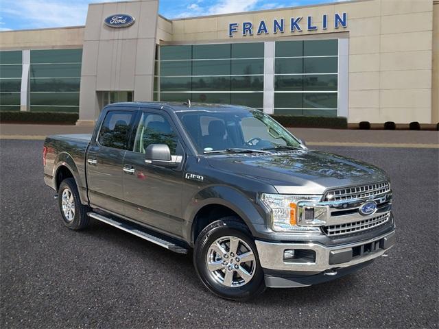 used 2019 Ford F-150 car, priced at $23,193
