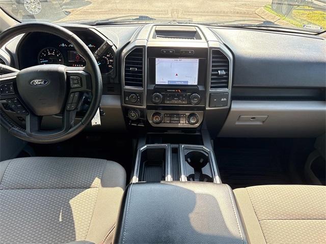 used 2019 Ford F-150 car, priced at $23,193