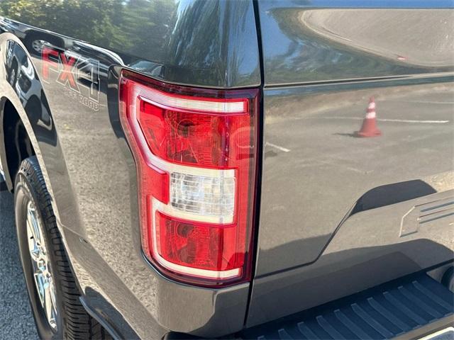used 2019 Ford F-150 car, priced at $23,193
