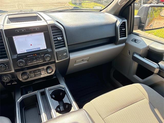 used 2019 Ford F-150 car, priced at $23,193