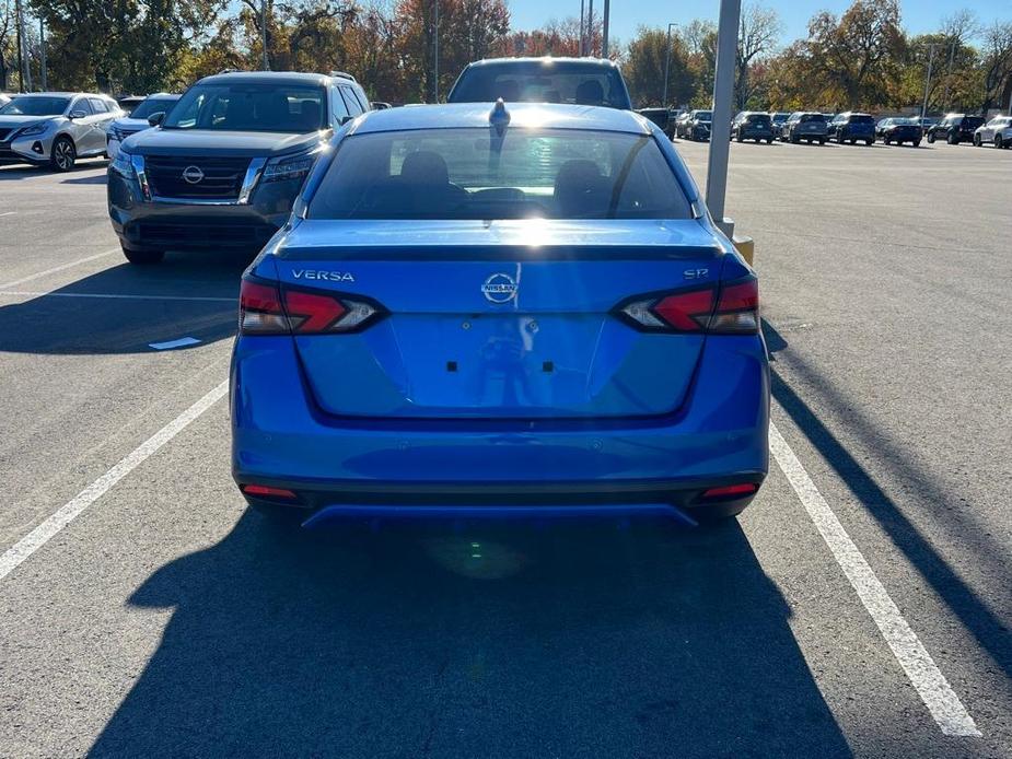 used 2021 Nissan Versa car, priced at $15,000