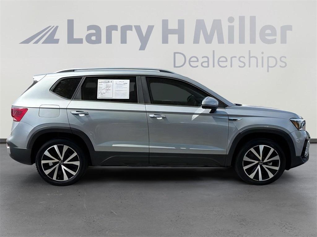 used 2023 Volkswagen Taos car, priced at $22,500