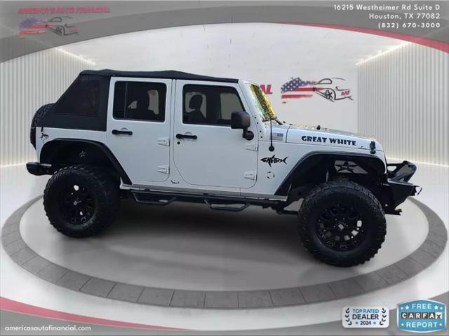 used 2012 Jeep Wrangler Unlimited car, priced at $15,995