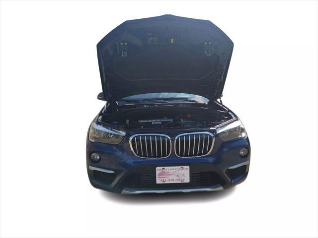 used 2018 BMW X1 car, priced at $14,995