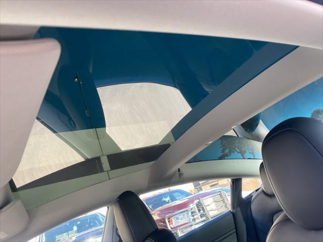 used 2023 Tesla Model 3 car, priced at $27,000
