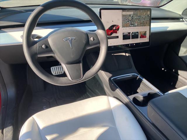 used 2022 Tesla Model 3 car, priced at $27,000