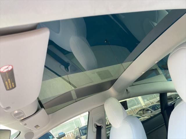 used 2022 Tesla Model 3 car, priced at $27,000