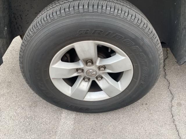 used 2018 Ram 1500 car, priced at $15,000