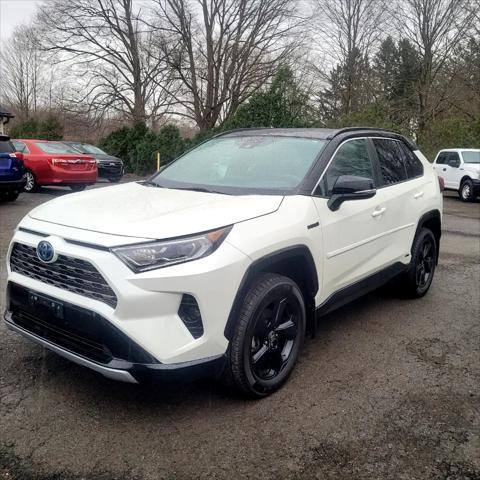 used 2021 Toyota RAV4 Hybrid car, priced at $35,000