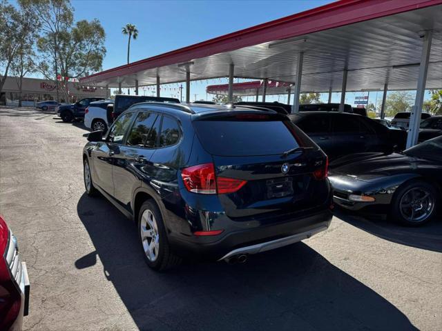 used 2015 BMW X1 car, priced at $11,000