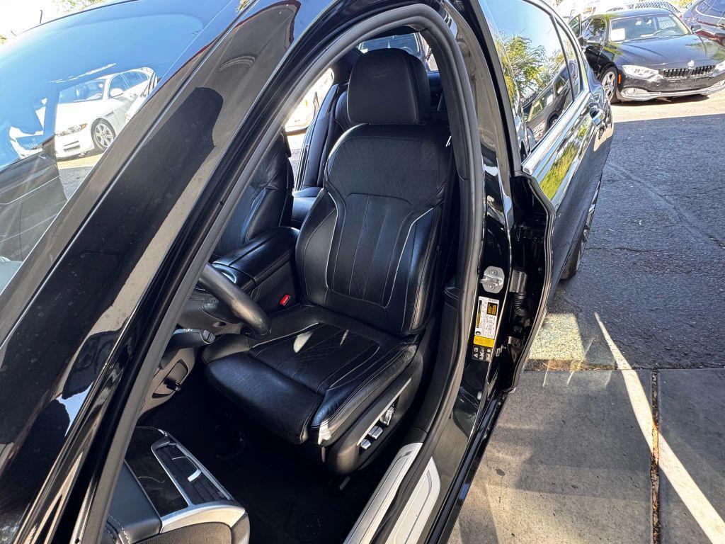 used 2016 BMW 750 car, priced at $22,250