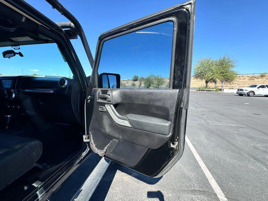 used 2011 Jeep Wrangler Unlimited car, priced at $12,550