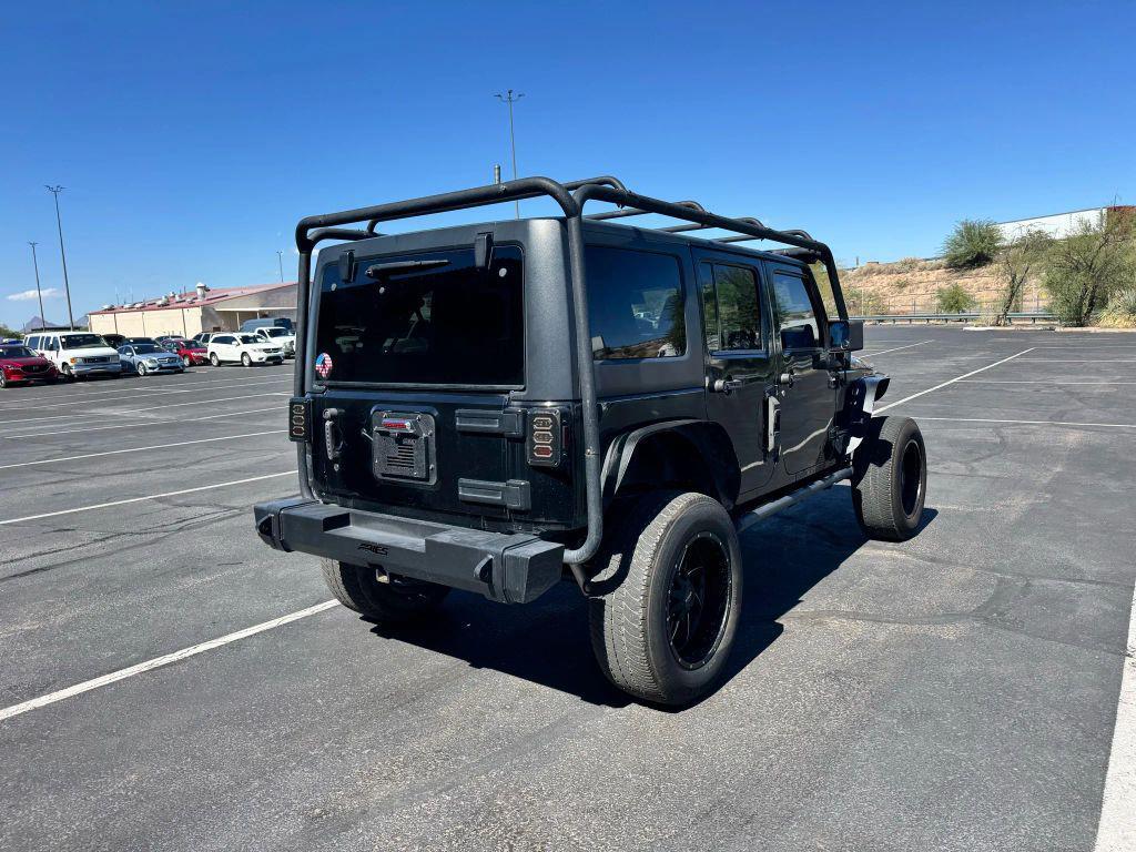 used 2011 Jeep Wrangler Unlimited car, priced at $12,550