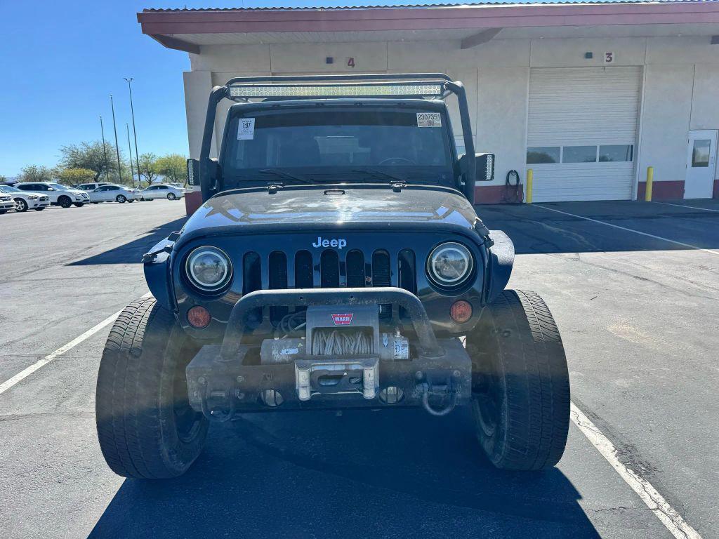 used 2011 Jeep Wrangler Unlimited car, priced at $12,550