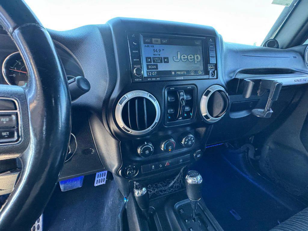 used 2011 Jeep Wrangler Unlimited car, priced at $12,550