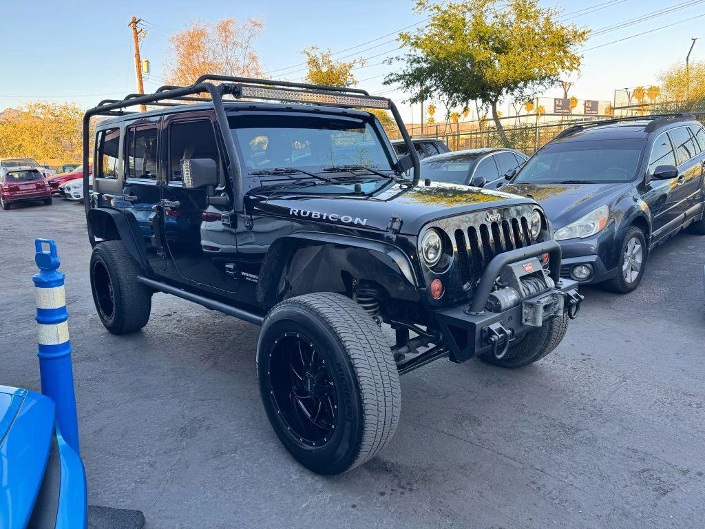 used 2011 Jeep Wrangler Unlimited car, priced at $12,550