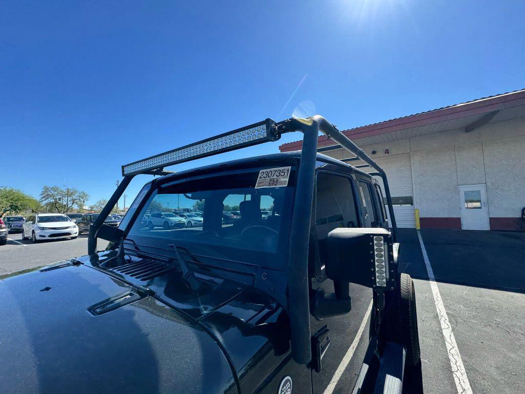 used 2011 Jeep Wrangler Unlimited car, priced at $12,550