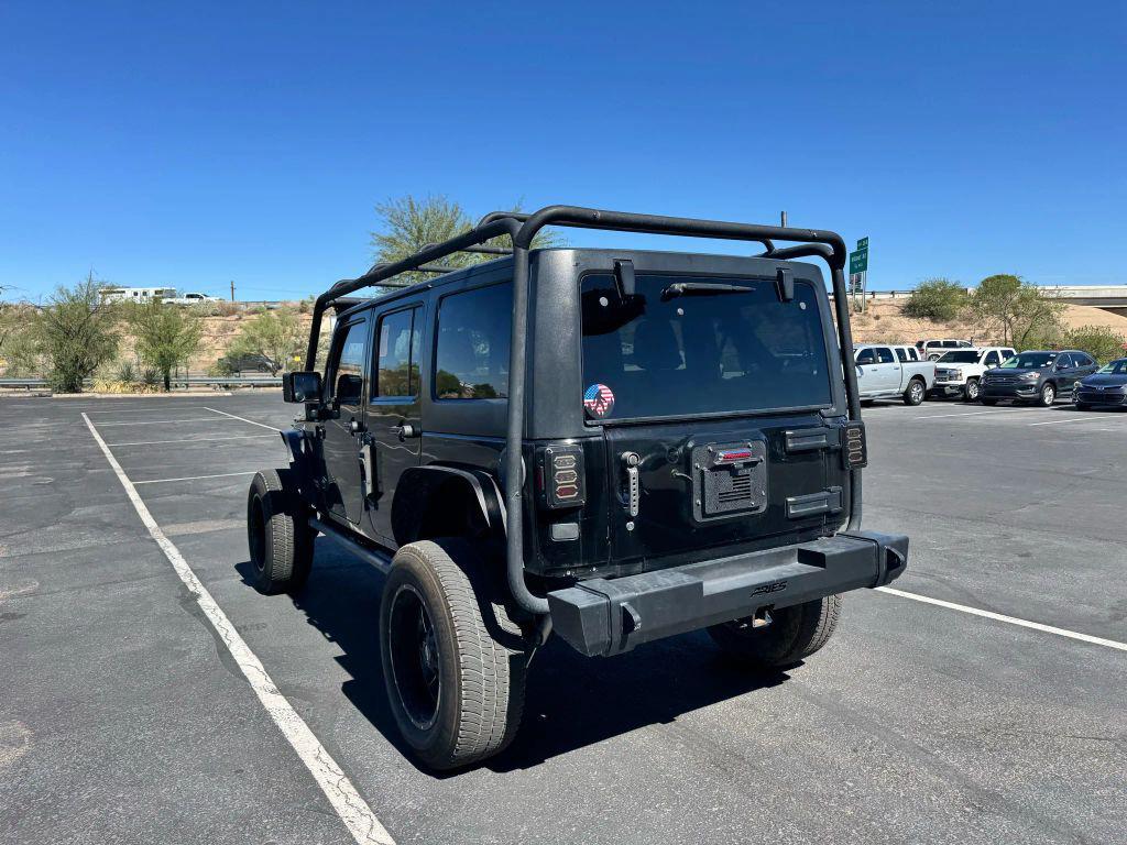 used 2011 Jeep Wrangler Unlimited car, priced at $12,550