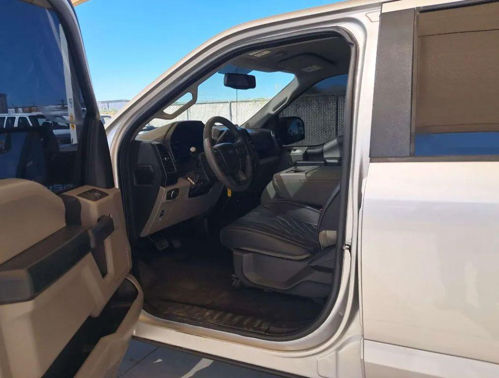 used 2015 Ford F-150 car, priced at $14,000