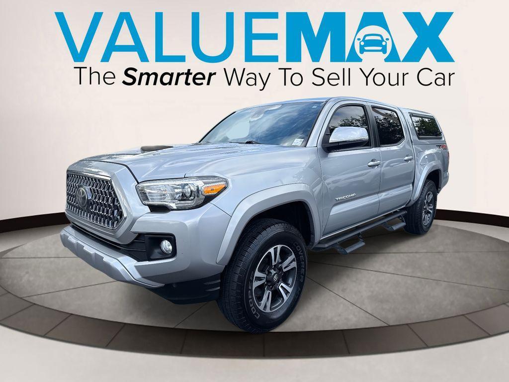 used 2019 Toyota Tacoma car, priced at $25,698