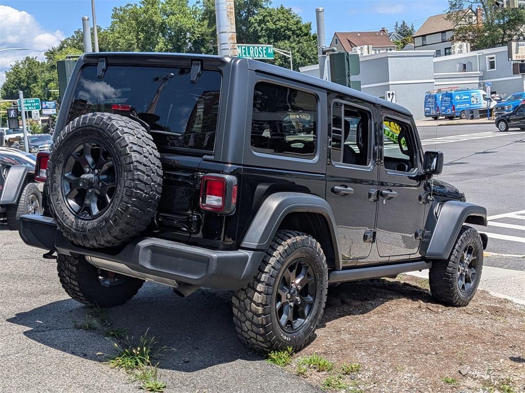 used 2021 Jeep Wrangler Unlimited car, priced at $33,998