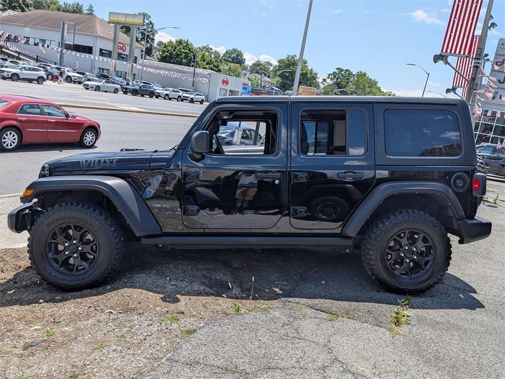 used 2021 Jeep Wrangler Unlimited car, priced at $33,998
