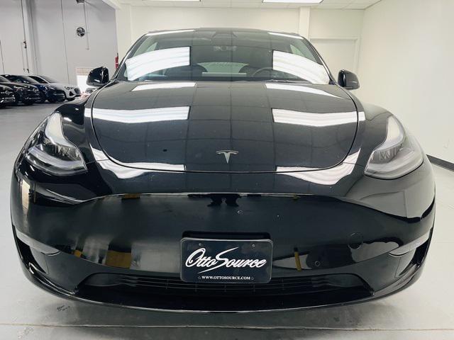 used 2022 Tesla Model Y car, priced at $29,999