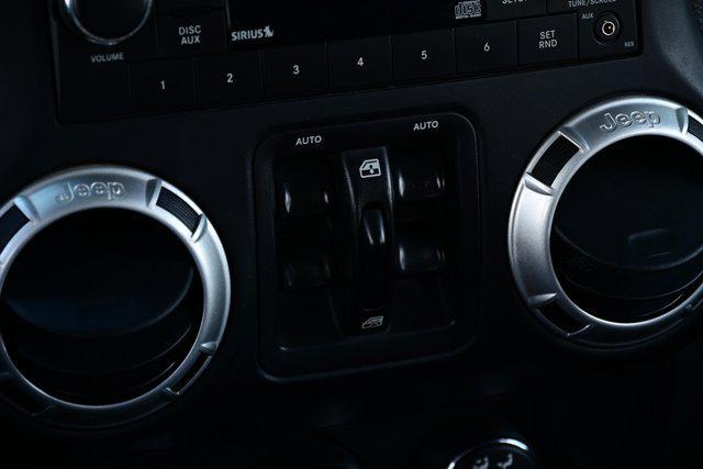 used 2015 Jeep Wrangler Unlimited car, priced at $18,988