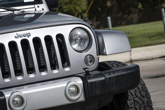 used 2015 Jeep Wrangler Unlimited car, priced at $18,988