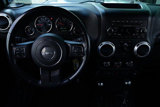 used 2015 Jeep Wrangler Unlimited car, priced at $18,988