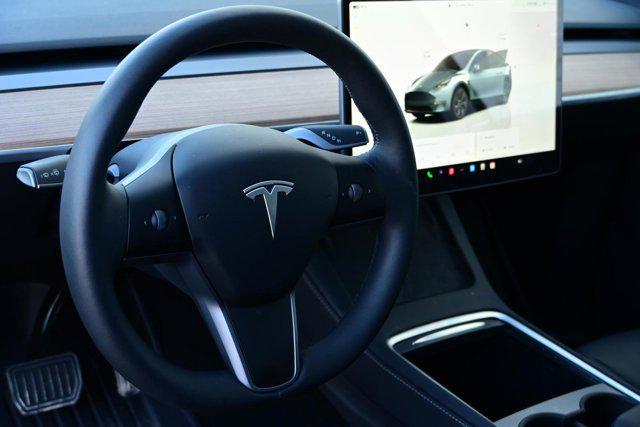 used 2025 Tesla Model Y car, priced at $38,987