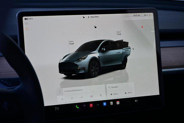 used 2025 Tesla Model Y car, priced at $38,987